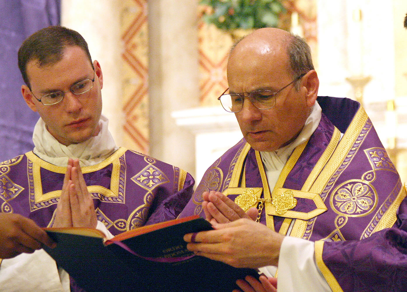 The Catholic Sun files
The Rev. Kenneth Walker, left, and the Rev. Joseph Terra celebrate Mass in Phoenix. The date is unknown. Walker was killed and Terra was critically injured Wednesday.