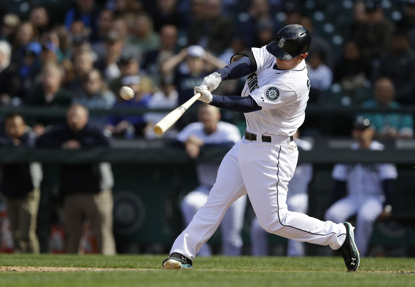 Seattle Mariners' Kyle Seager hits a three-run go-ahead home run in the eighth inning Sunday as the Mariners went on to beat the Texas Rangers 6-5. (AP Photo/Ted S.