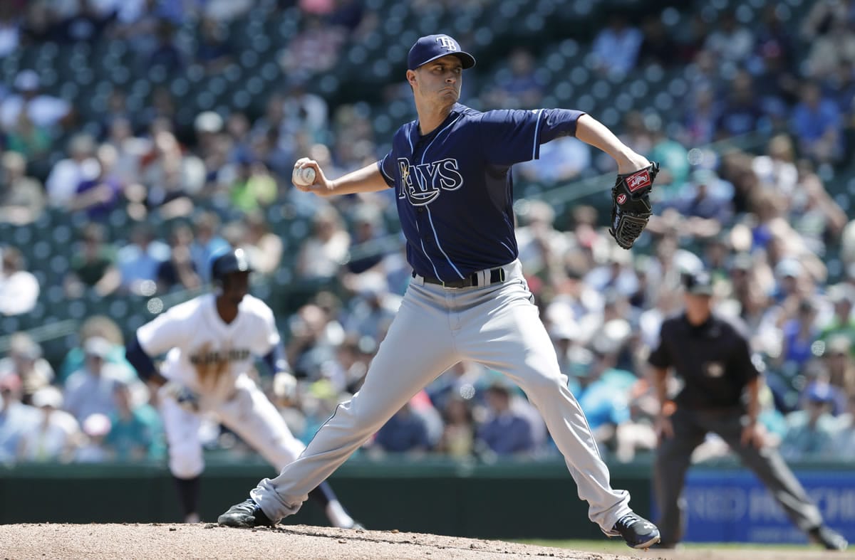 Tampa Bay Rays starting pitcher Jake Odorizzi throws against the Seattle Mariners on Wednesday, May 14, 2014, in the first inning of a baseball game in Seattle.