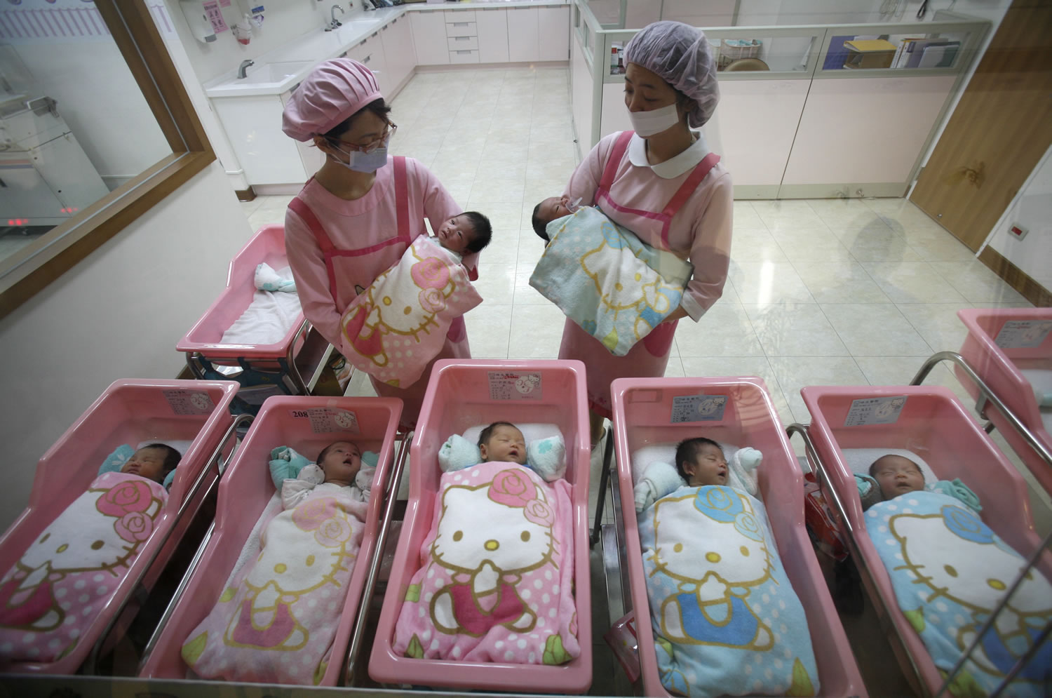 Nurses check on newborns at the Hello Kitty-designed maternity ward at the Hau Sheng hospital in the southern Taiwan city of Chunghua.