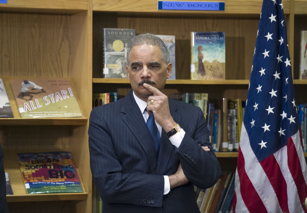 Attorney General Eric Holder participates Friday in a discussion on the importance of universal access to preschool and the need to reduce &quot;unnecessary and unfair school discipline practices and other barriers to equity and opportunity at all levels of education&quot; at J.