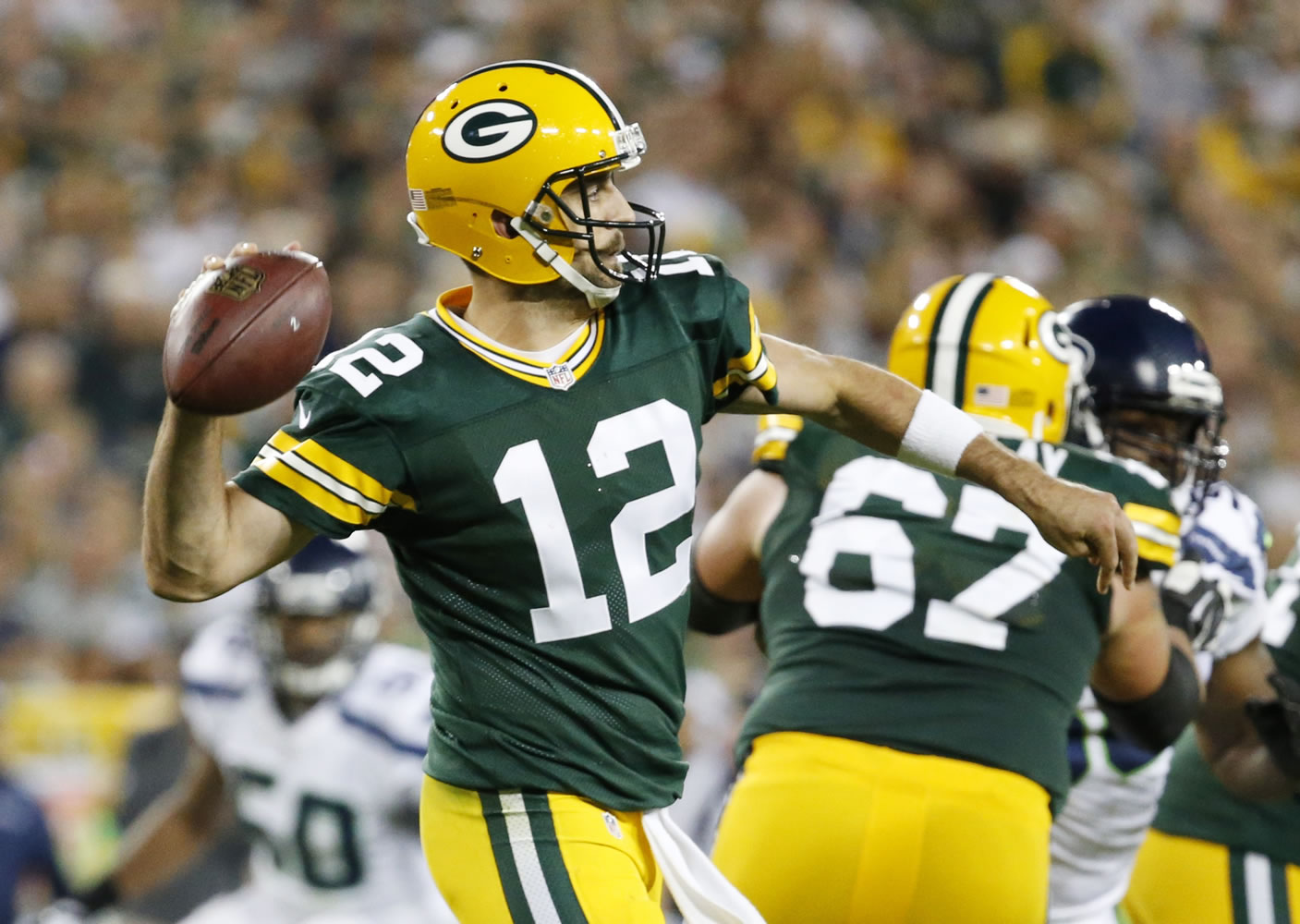 Green Bay Packers' Aaron Rodgers during the first half of an NFL football game against the Seattle Seahawks Sunday, Sept. 20, 2015, in Green Bay, Wis.