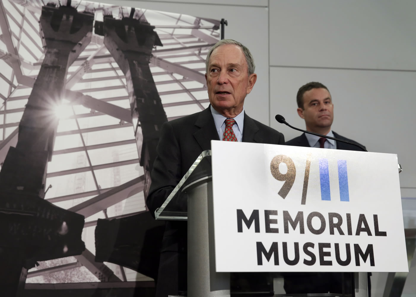 Former New York Mayor Michael Bloomberg, left, chairman of the Sept.