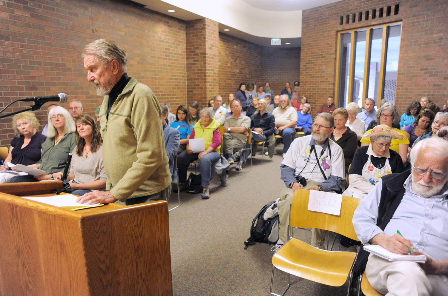 Guemes Island resident and retired pastor Rev Robert Anderson starts off the public comment Wednesday at a The North-West Clean Air Agency public hearing for comments on the renewal of the draft Air Operating Permit for the Shell Refinery at Anacortes.