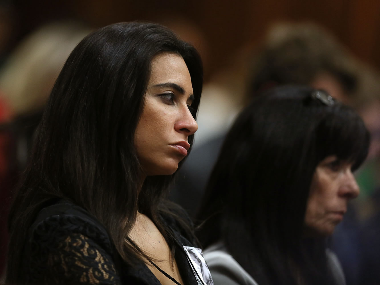 Friend of the late Reeva Steenkamp, Kim Myers, listens to a witness giving evidence during the murder trial of Oscar Pistorius in Pretoria, South Africa, on Tuesday.