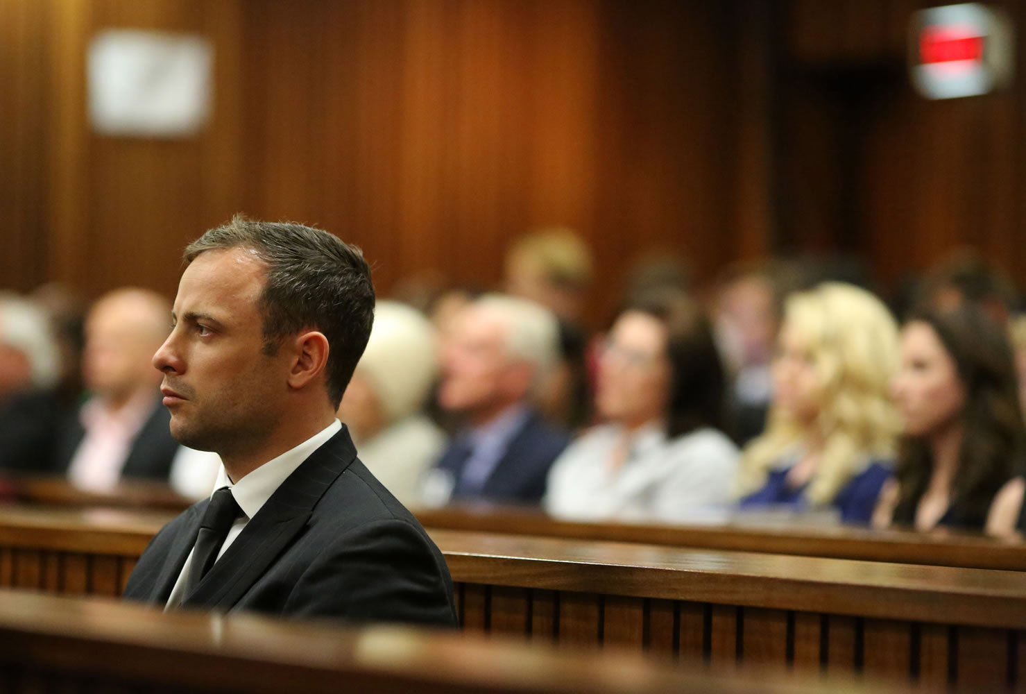 Oscar Pistorius sits in the dock looking in court in Pretoria, South Africa on Friday, Sept. 12. Judge Thokozile Masipa found Pistorius guilty of culpable homicide for the shooting death of his girlfriend Reeva Steenkamp. Sentencing procedures will start Oct.
