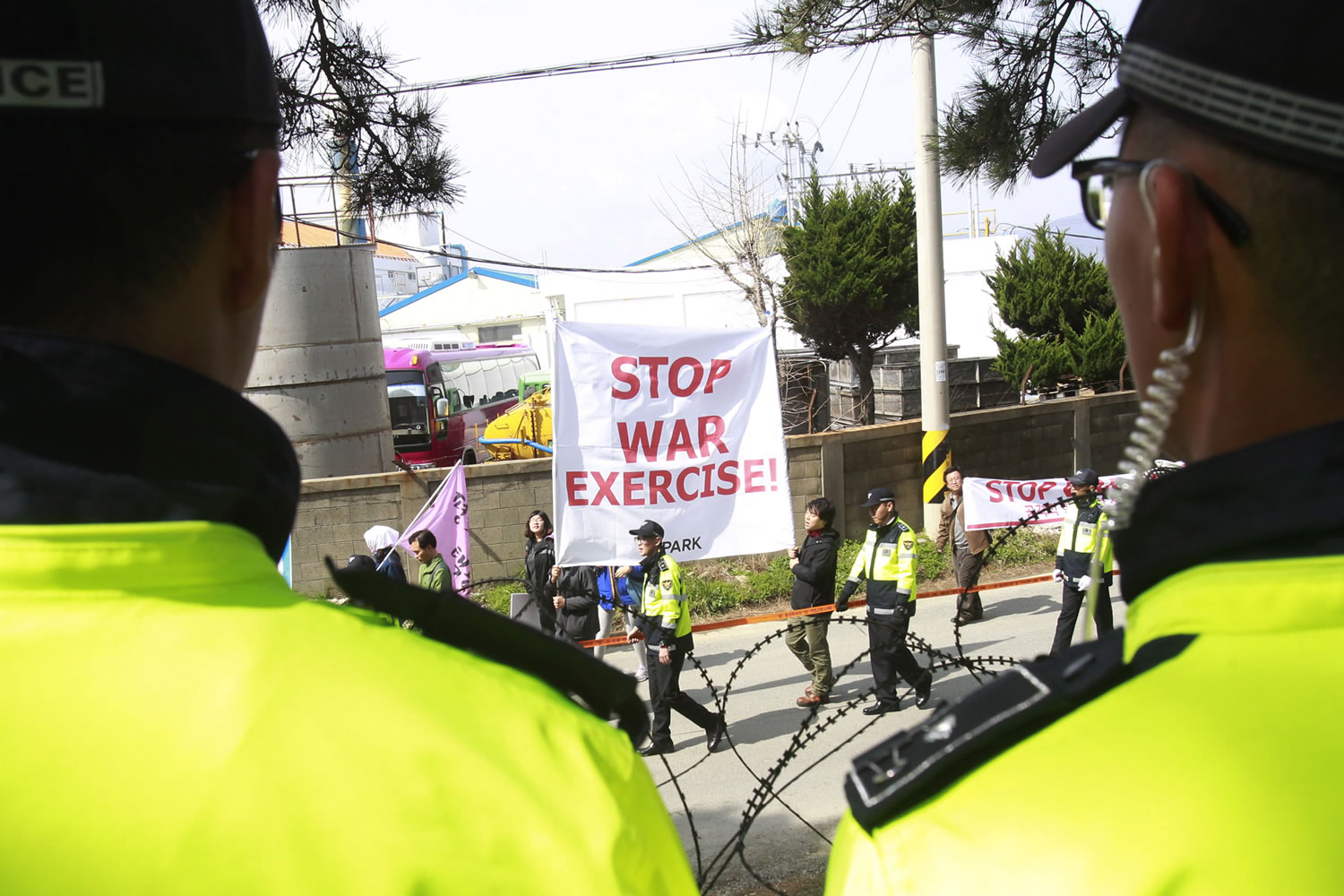 Anti-war protesters march during the U.S.-South Korea joint landing exercises called Ssangyong as part of the Foal Eagle military exercises in Pohang, South Korea, on Monday.
