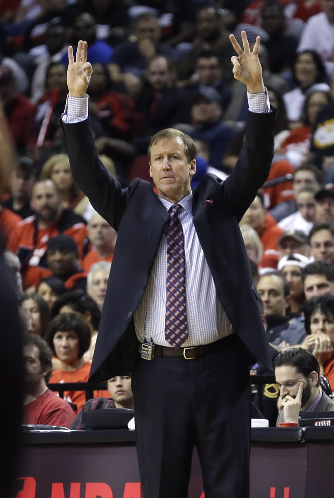 Portland Trail Blazers head coach Terry Stotts directs his team during Game 3 of a Western Conference semifinal NBA basketball playoff series against the San Antonio Spurs, Saturday, May 10, 2014, in Portland, Ore.