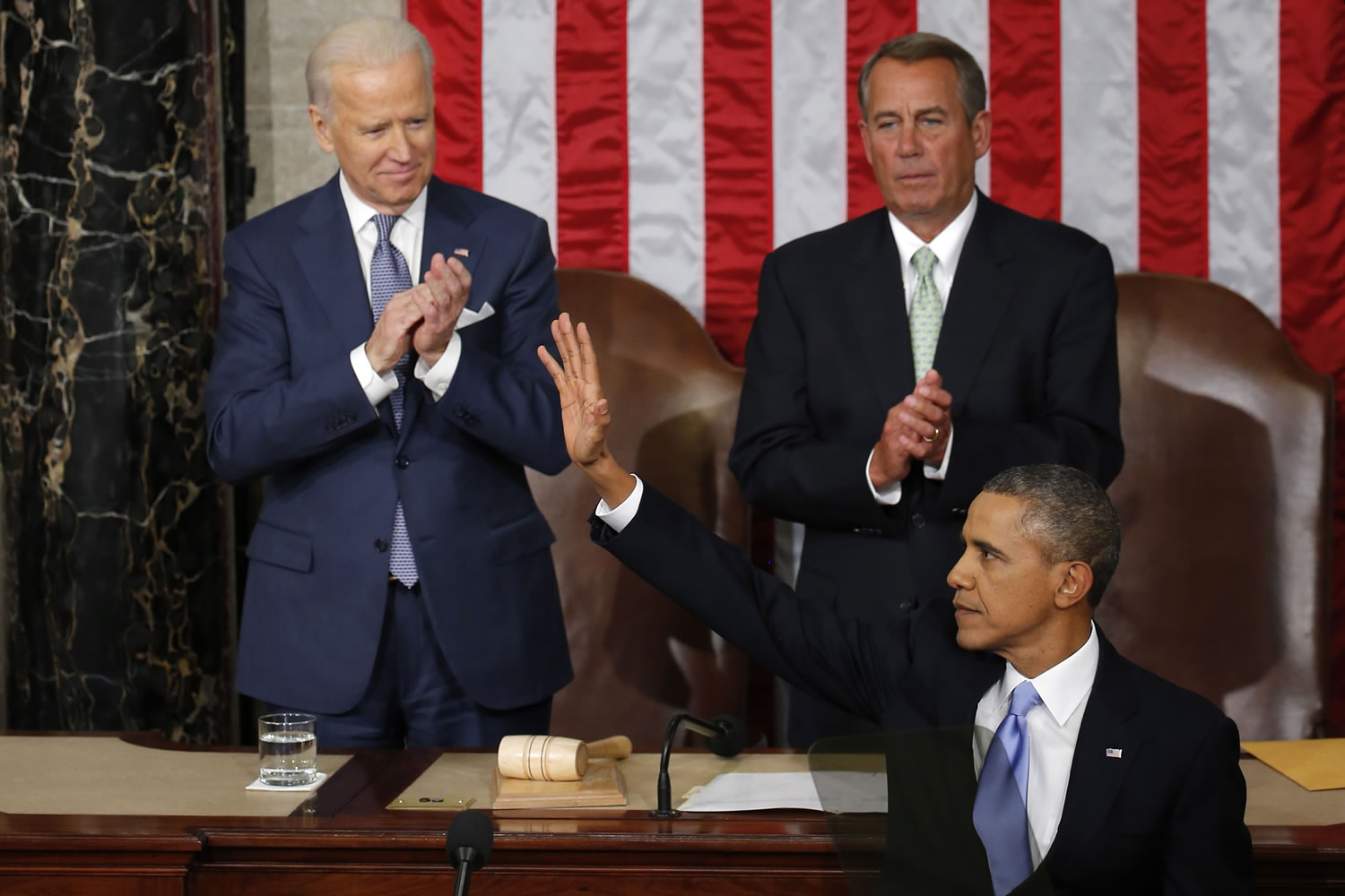 President Barack Obama waves after giving his State of the Union address on Capitol Hill in Washington on Tuesday.