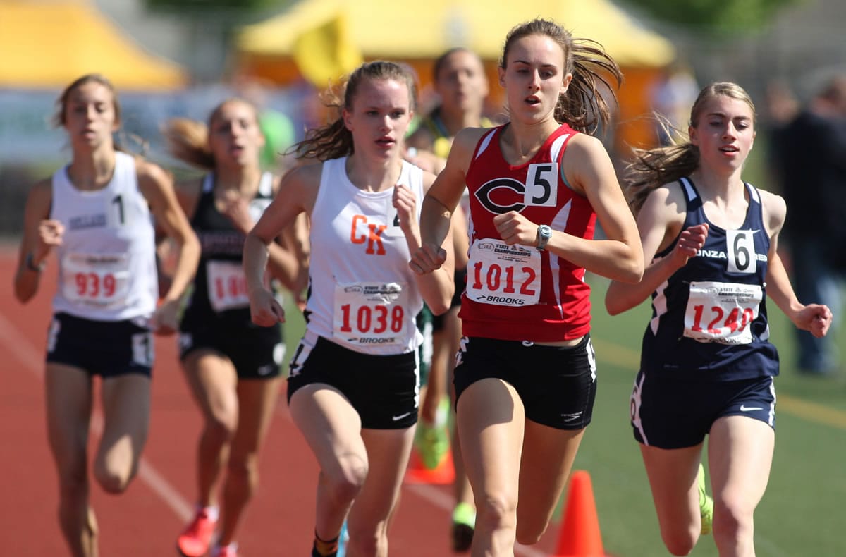 Camas's Alexa Efraimson leads the pack of runners with Central Kitsap's Rose Christen on her heels in the 4A  Finals at the Washington State Track and Field Meet on May 31, 2014 at Mount Tahoma Stadium in Tacoma, WA. Efraimson clocked in with a meet-record time of 2:04.10 to place first, while Christen took second with 2:05.64.