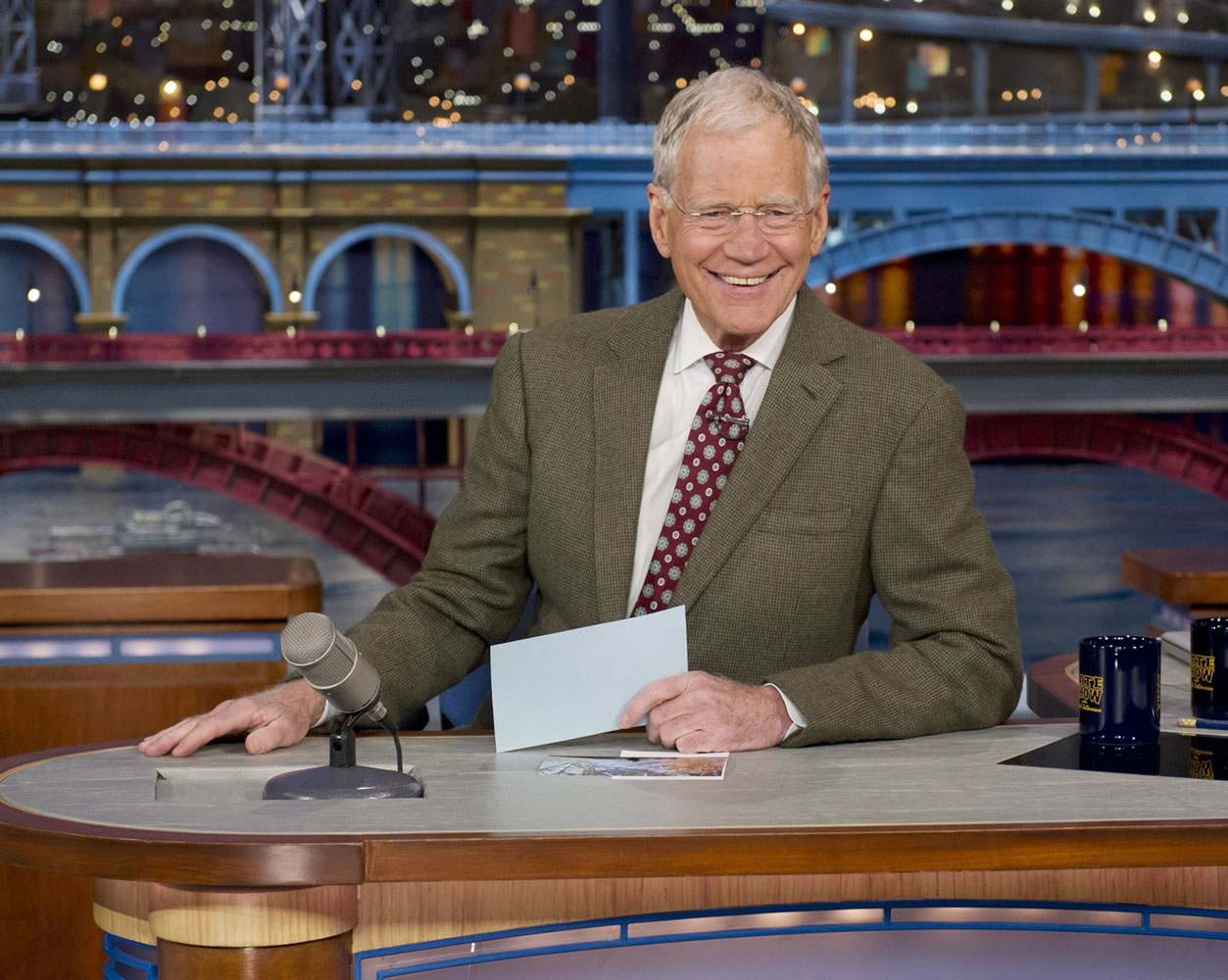 David Letterman, host of the &quot;Late Show with David Letterman,&quot; is seated at his desk April 3 in New York.