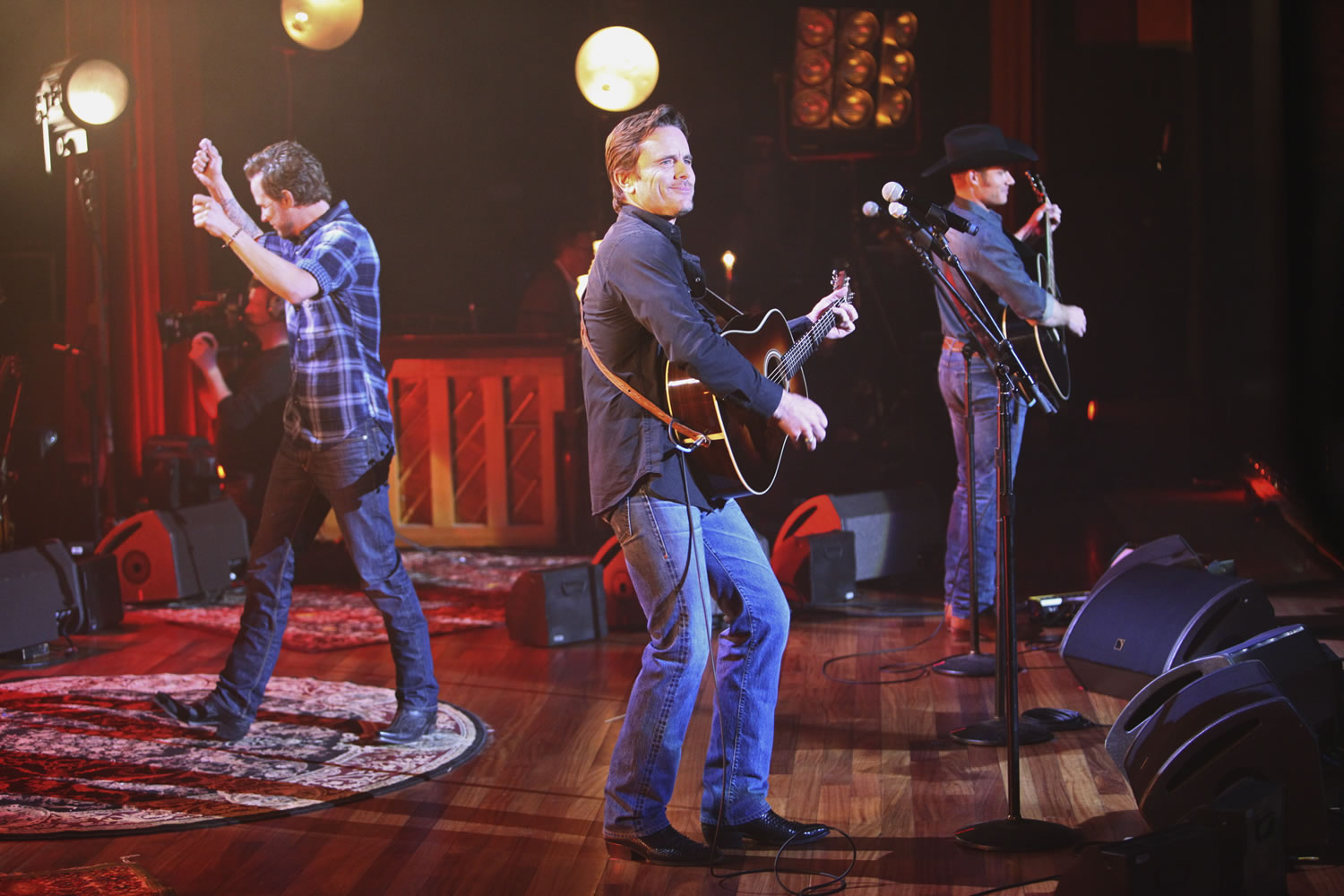 Will Chase, from left, Charles Esten and Chris Carmack perform on a special &quot;Nashville: On the Record,&quot; episode at the Ryman Auditorium, in Nashville, Tenn.