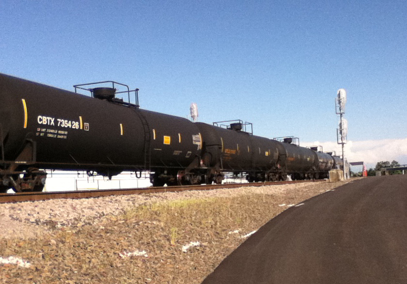 A train of tank cars passes on the BNSF Railway tracks through Vancouver on May 30, 2014.