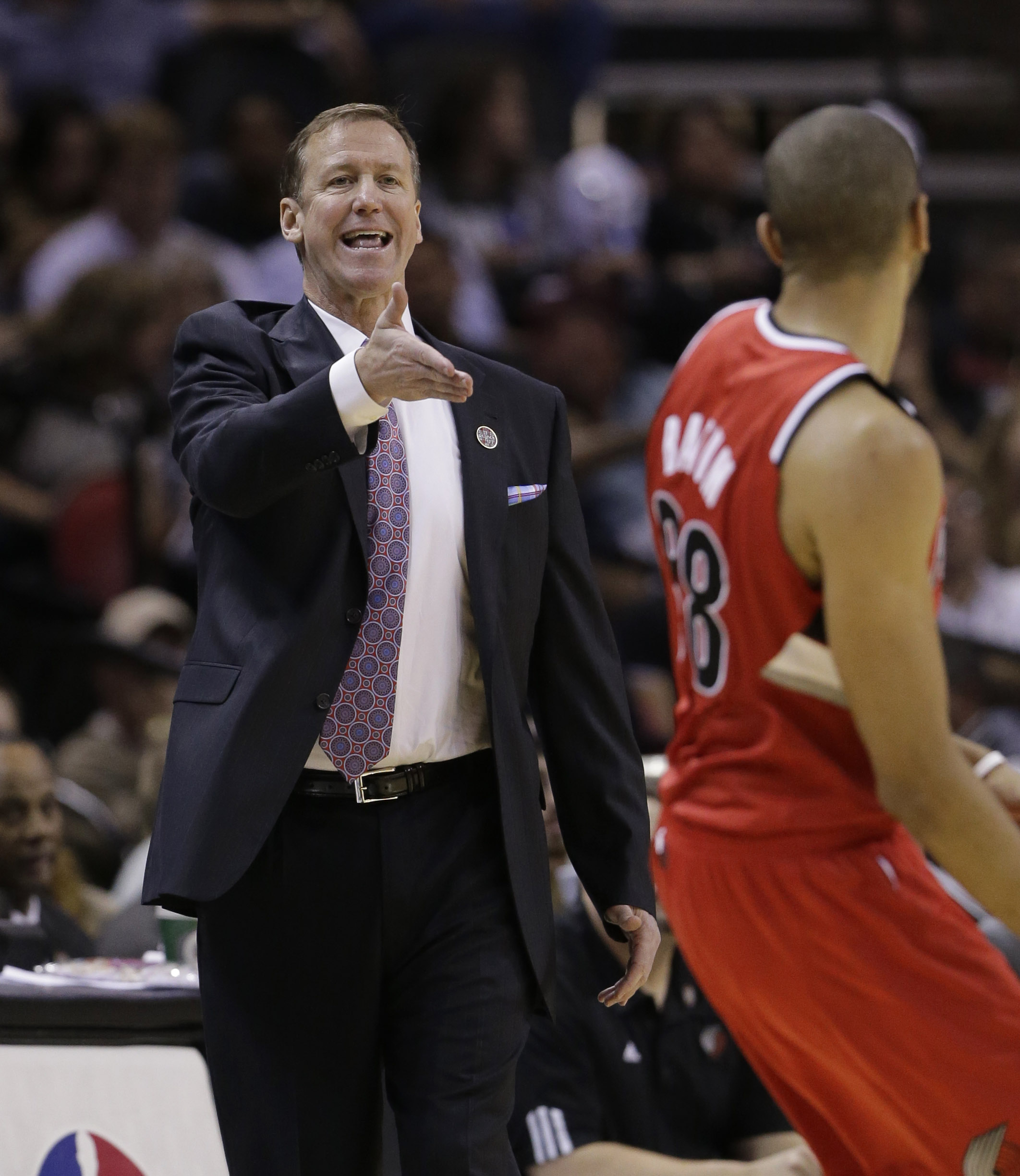 Portland Trail Blazers coach Terry Stotts, left, calls to his players during the first half of Game 5 against the San Antonio Spurs.