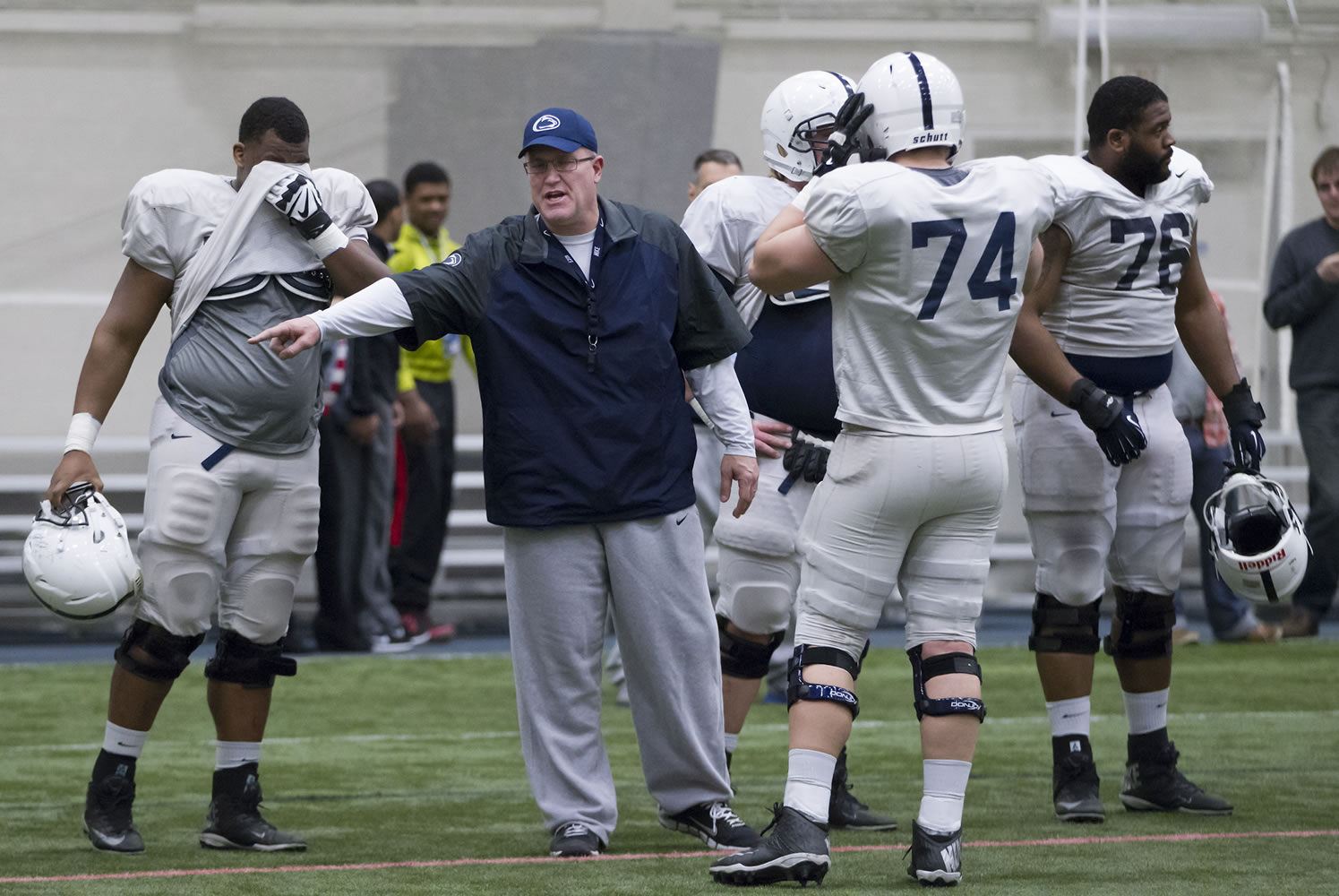 Associated Press
Penn State offensive line coach Herb Hand motions to players during a team practice in State College, Pa.