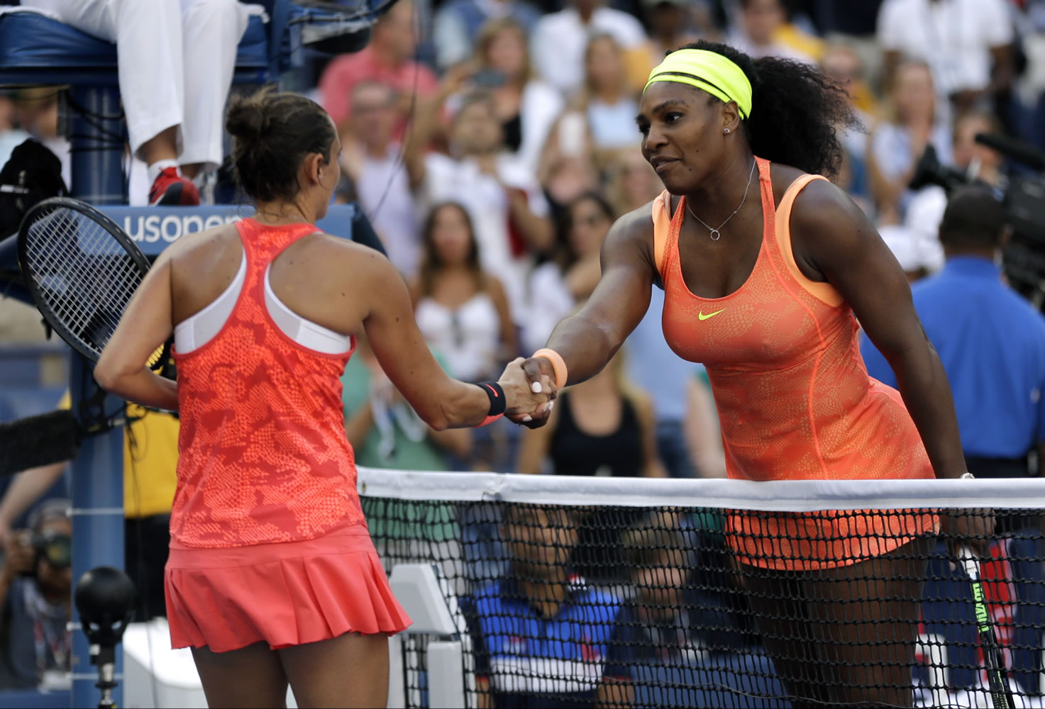 Serena Williams, right, shakes hands with Roberta Vinci, of Italy, after losing a semifinal match at the U.S. Open tennis tournament, Friday in New York.