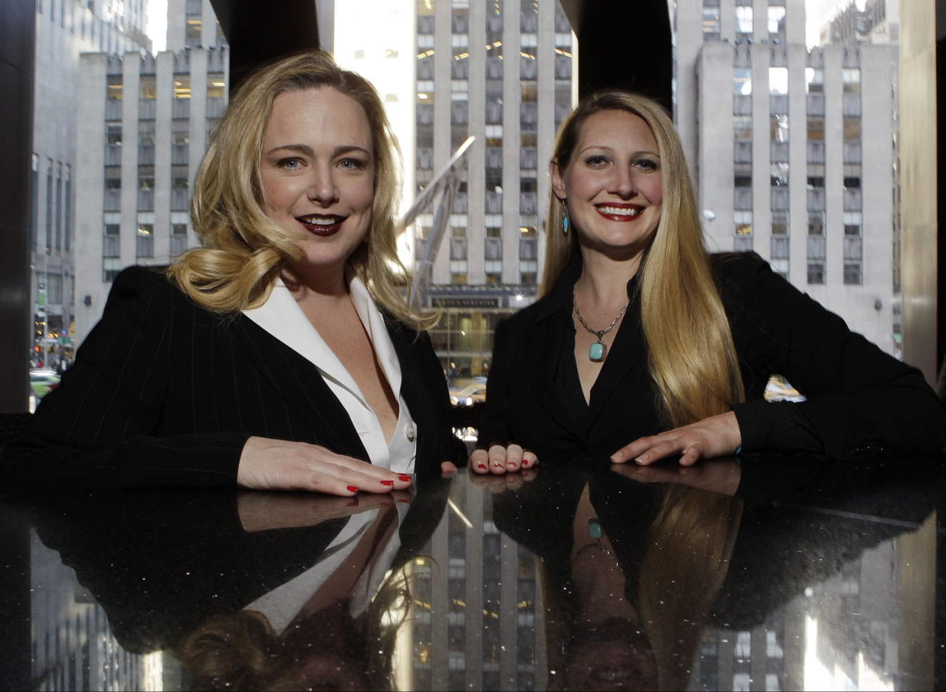 Crystl Faye Horton-Friedman, right, and Kristin Beckler are both mothers and work as sommeliers at Del Frisco's in New York.