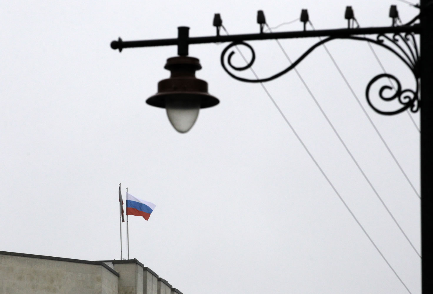 The Russian flag flies on a local government building Thursday in Simferopol, Ukraine.