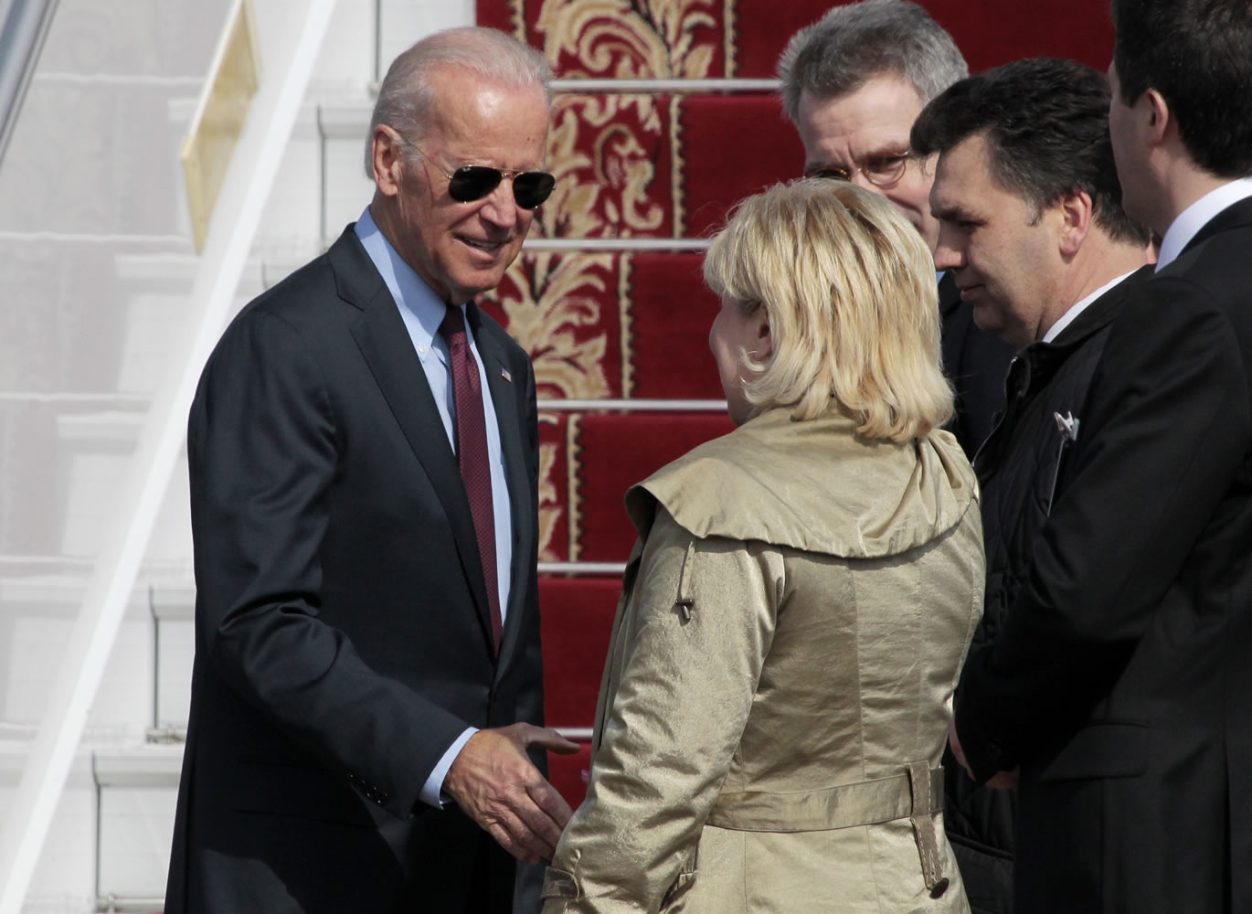U.S. Vice President Joe Biden, left, is greeted upon arrival at Borispol airport outside Kiev, Ukraine, on Monday.