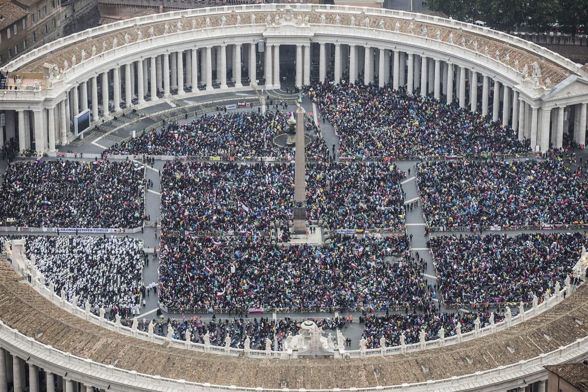 A view of  St. Peter's Square at the Vatican, packed with faithful is seen Sunday. Tens of thousands of people have filled St.