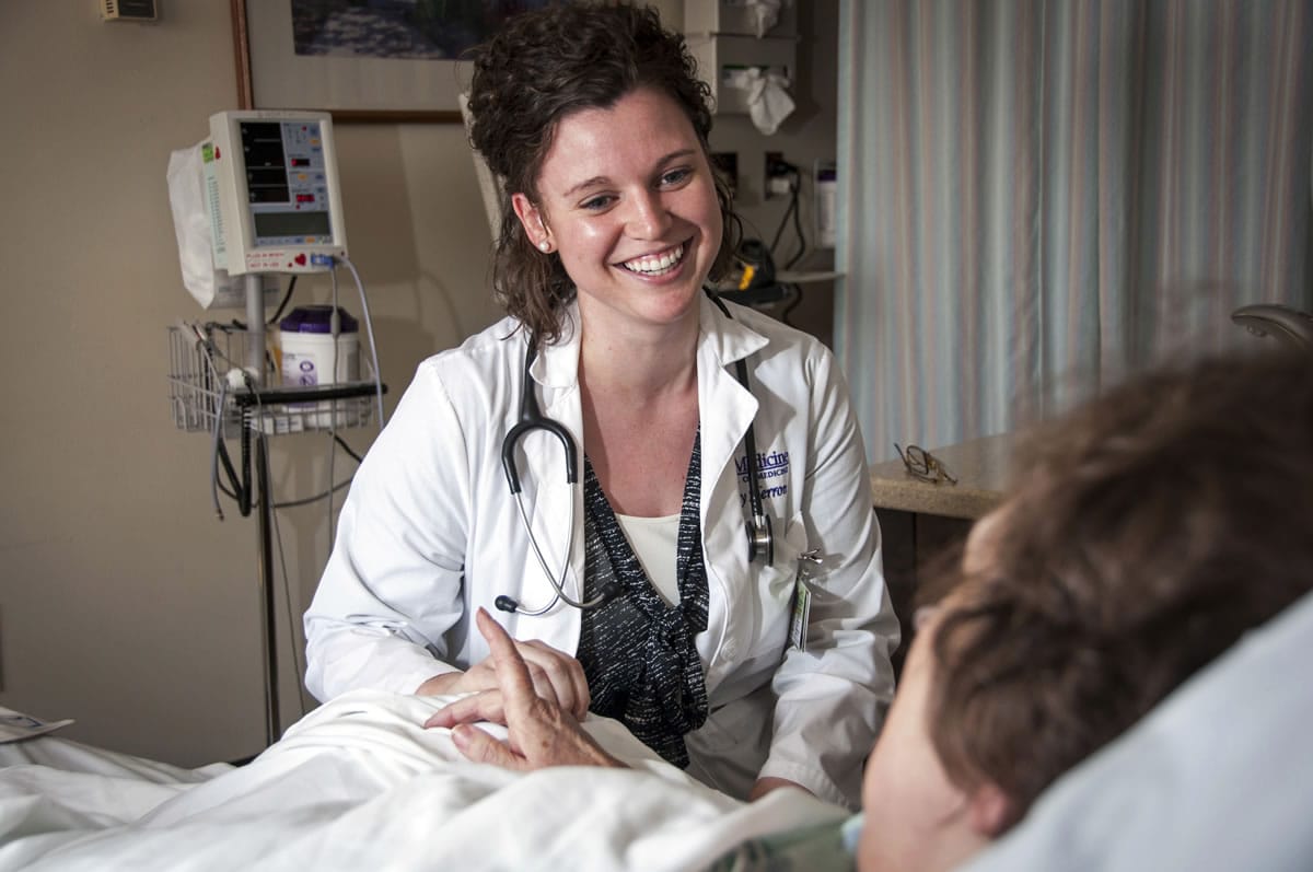 Medical student Kacy Herron takes a patient history at Sacred Heart Medical Center in Spokane in Setember, Projecting a looming shortage of doctors in the state, Washington State is exploring the creation of its own medical school.