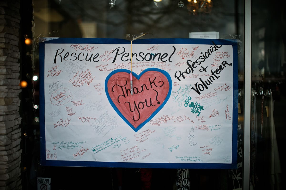 Townspeople have erected all manner of signs to show their appreciation for search and rescue personnel working on the landslide in Oso on April 9.