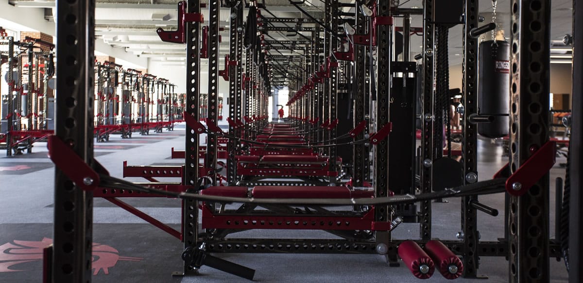 Part of the weight room in Washington State's new Cougar Football Complex is seen during a media tour Tuesday, June 3, 2014, in Pullman, Wash. The building was made possible by the Pac-12's lucrative television contract, which will pay the Cougars an average of $20.5 million a year for 12 years.