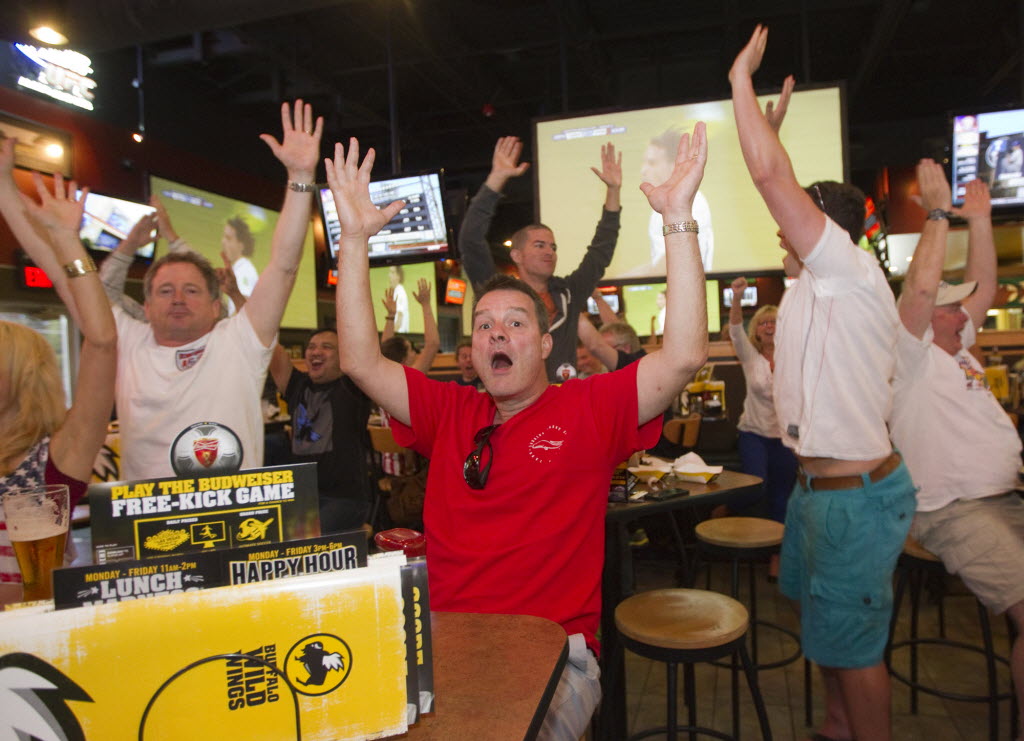 Clark County soccer fans at Buffalo Wild Wings in Hazel Dell celebrate a U.S. goal during Sunday's World Cup match.