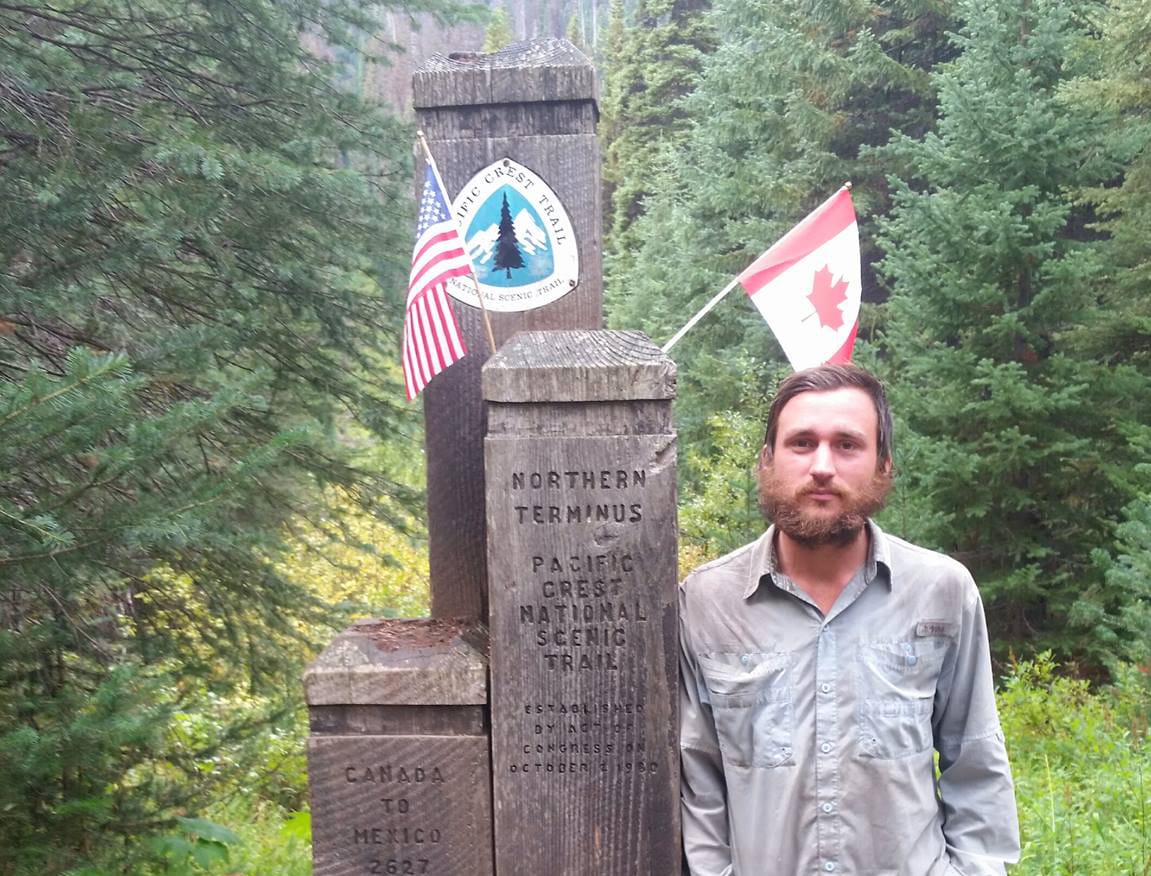 Morgen Glessing at the U.S.-Canadian border on the Pacific Crest National Scenic Trail