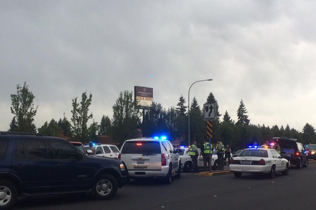 Police respond to an incident with shots fired at Northeast 99th and Highway 99 in Hazel Dell.