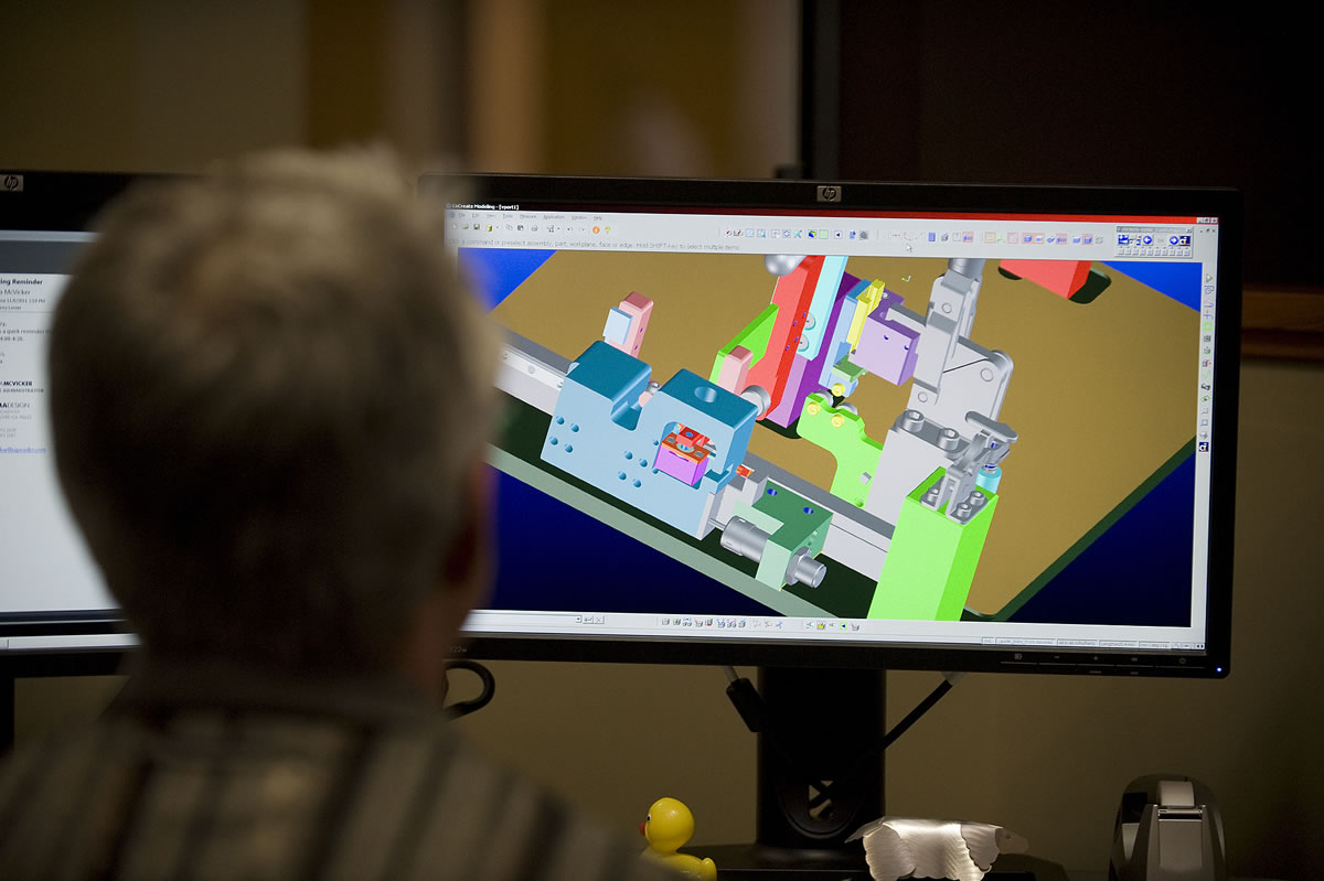 A mechanical engineer works on a 3D CAD model at Sigma Design in Vancouver in 2011.