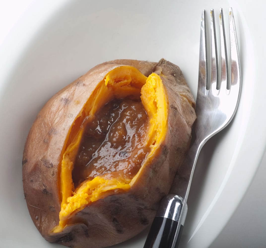 Miso paste is a nice topper for a baked sweet potato; miso is made from soybeans and delivers flavor and protein.