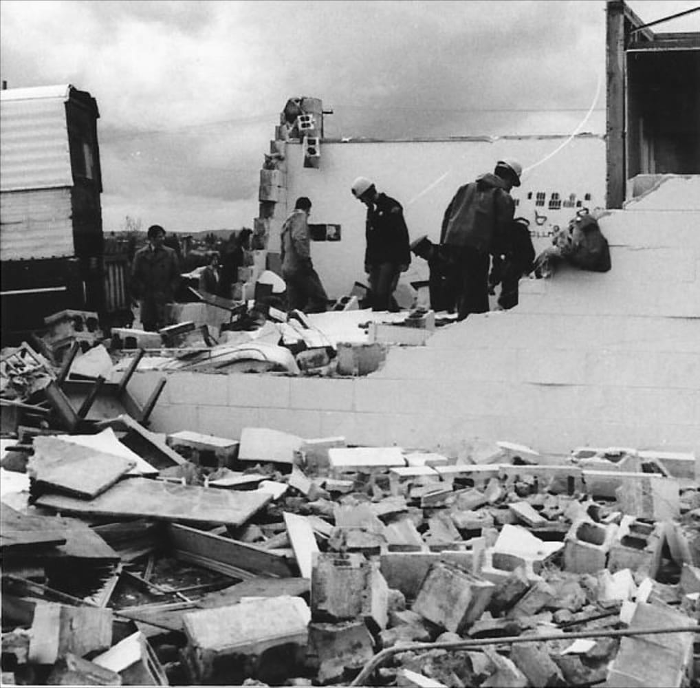 Officials look through the rubble after a tornado devastated Peter S. Ogden Elementary on April 5, 1972.
