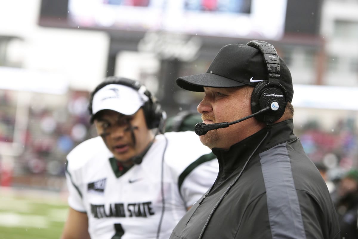 Portland State head coach Bruce Barnum, right, watches during the first half of an NCAA college football game against Washington State, Saturday, Sept. 5, 2015, in Pullman, Wash.
