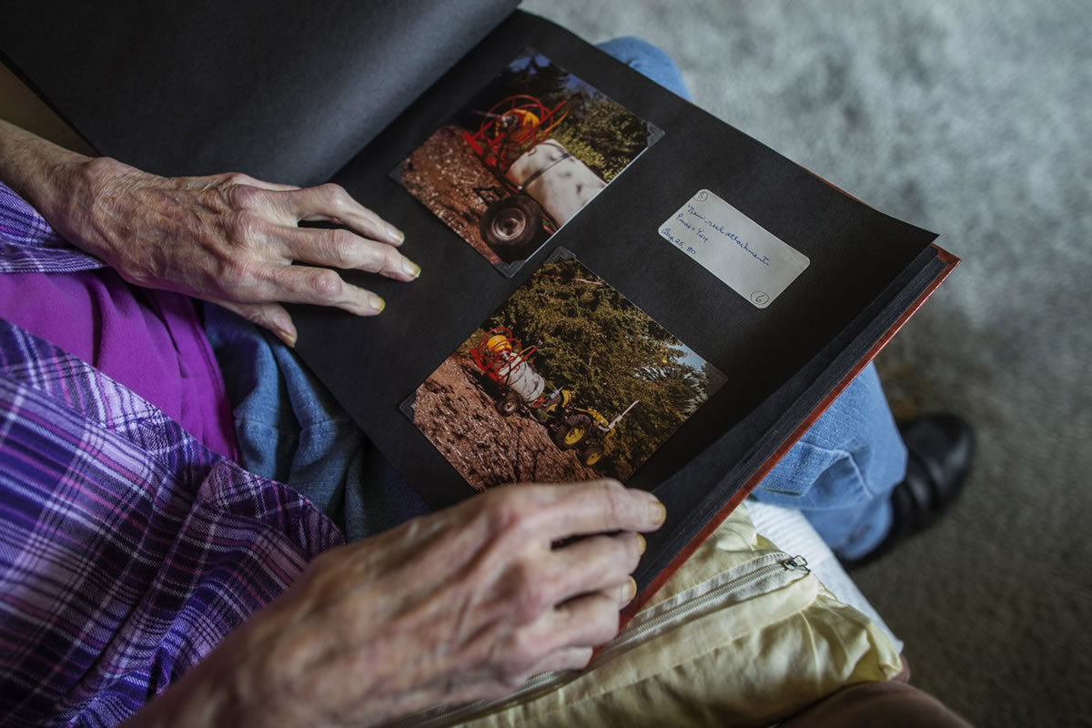 Fir Butler maintains scrapbooks containing decades of photographs from her treks through the mountains to her efforts to turn her home into an arboretum.