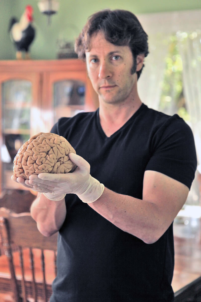 Dr. David Eagleman holds a human brain donated to The M.I.N.D. Institute, University of California at Davis Medical Center for science research. His series, &quot;The Brain with David Eagleman,&quot; airs Wednesdays on PBS.