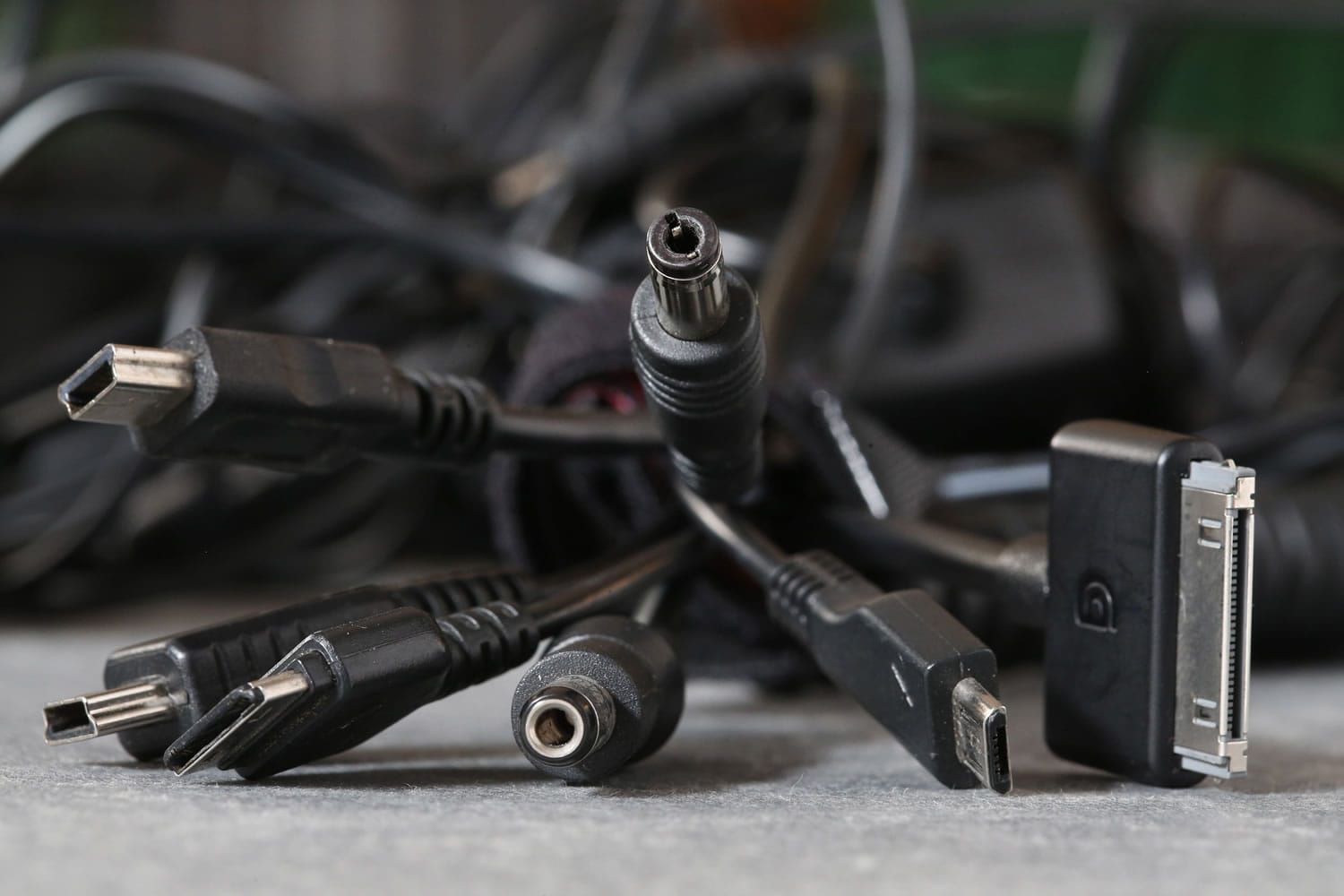 A variety of digital connecting cords are displayed among a tangle of donated devices and connectors at Northwestern University in Evanston, Ill.