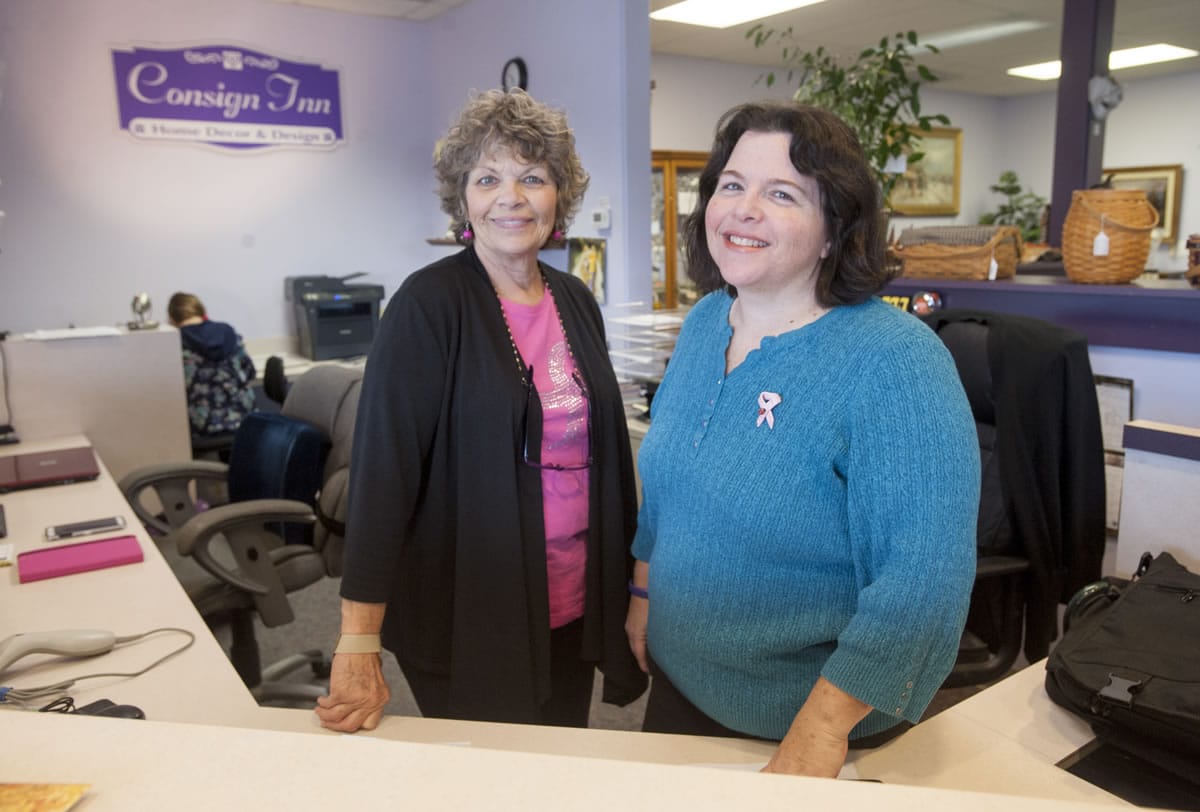 Michelle Bart, president of the National Women&#039;s Coalition Against Violence and Exploitation, right, and her mother, Donna Bart, at their Consign Inn shop in Hazel Dell. The store along Highway 99 opened on Labor Day weekend.