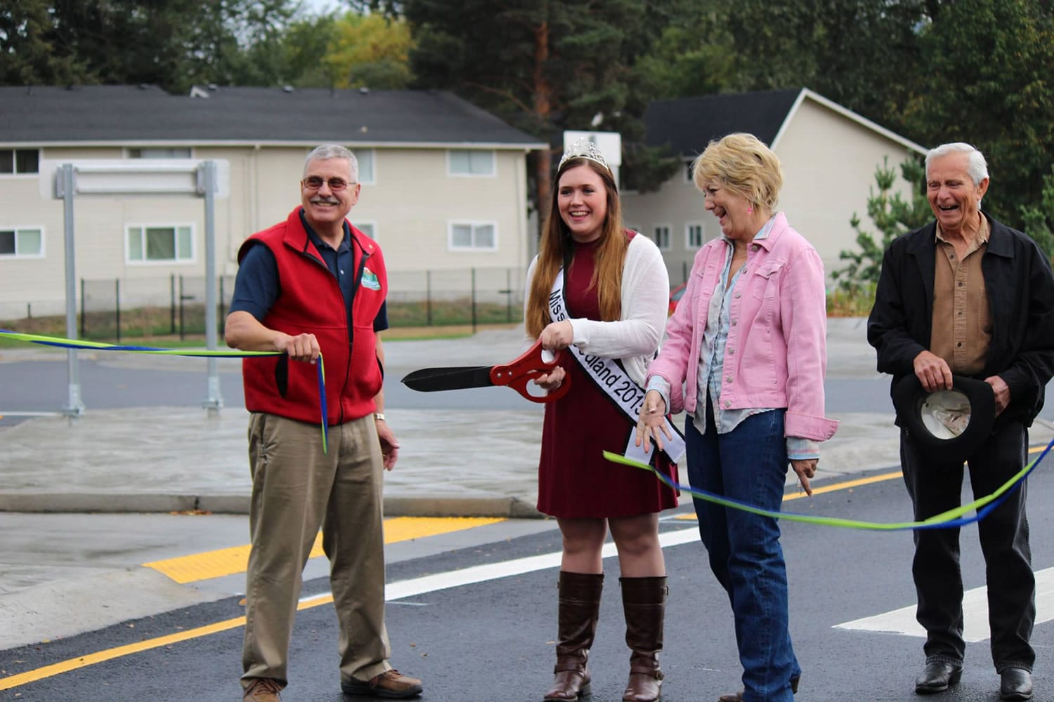 Woodland: Woodland Mayor Grover Laseke, from left, Miss Woodland 2015 Taylor Vossen and Woodland councilors Susan Humbyrd and Marshall Allen are a ribbon-cutting ceremony to announce the completion of improvements to the state Highway 503 and East Scott Avenue roundabout intersection.