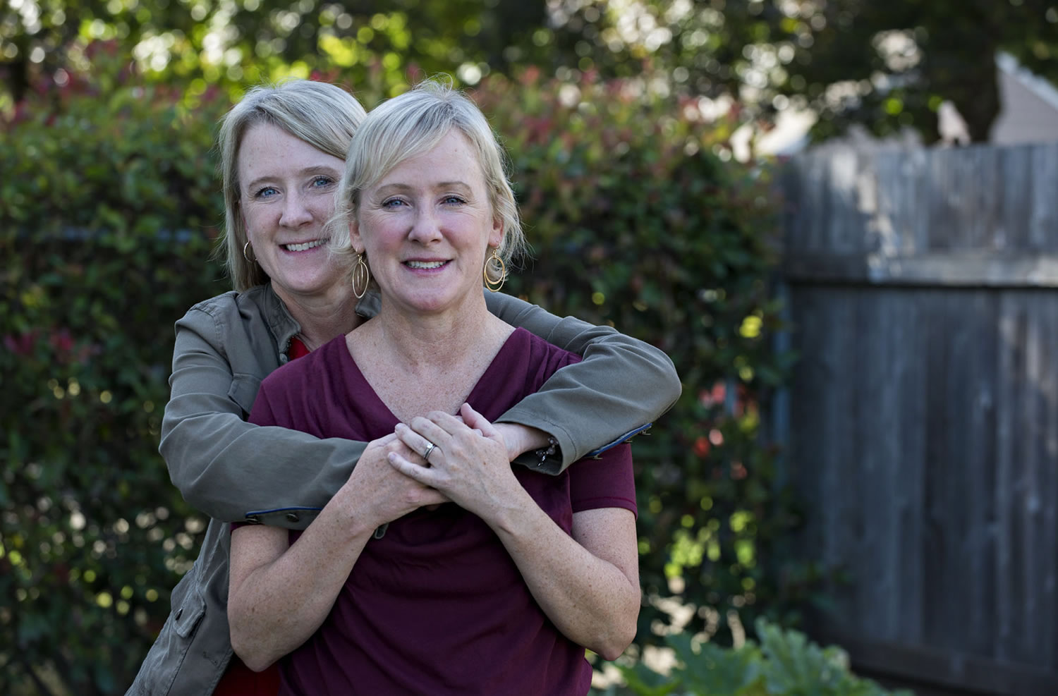 Mary Sullivan, in jacket, and her twin sister, Meg Perlick, both of Vancouver, are both breast cancers survivors who have gone on to lead healthy, active lives.