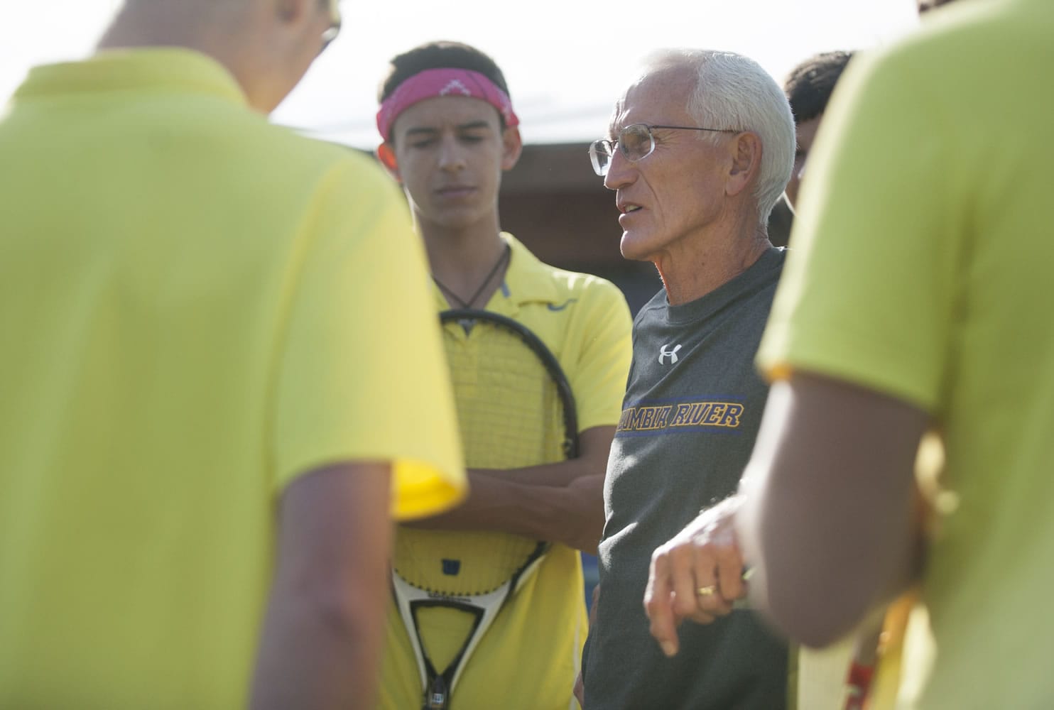Columbia River coach Jim Chapman talk to students before a tennis match in Vancouver Wednesday October 14, Chapman is retiring later this month.