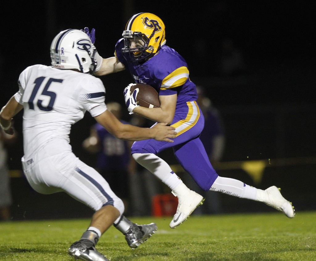 Columbia River wide receiver Blake Duhamel (right) runs back kickoff against Skyview defender Aaron Wise (15).