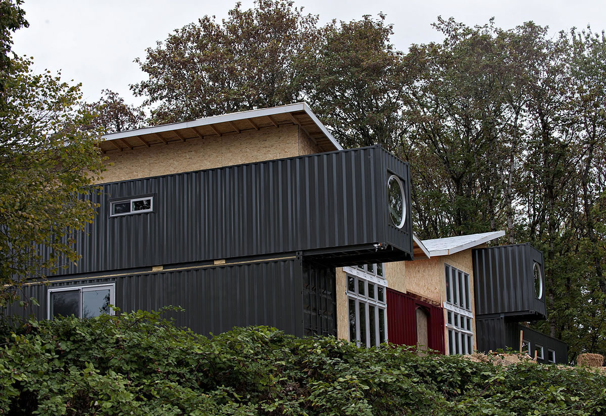 A new home being built using 11 former cargo shipping containers is under construction at 4211 S.E. 164th Ave. in Vancouver. The home is the first of its kind in the city, although the use of shipping containers for homes, offices and cottages is catching on locally and nationally.
