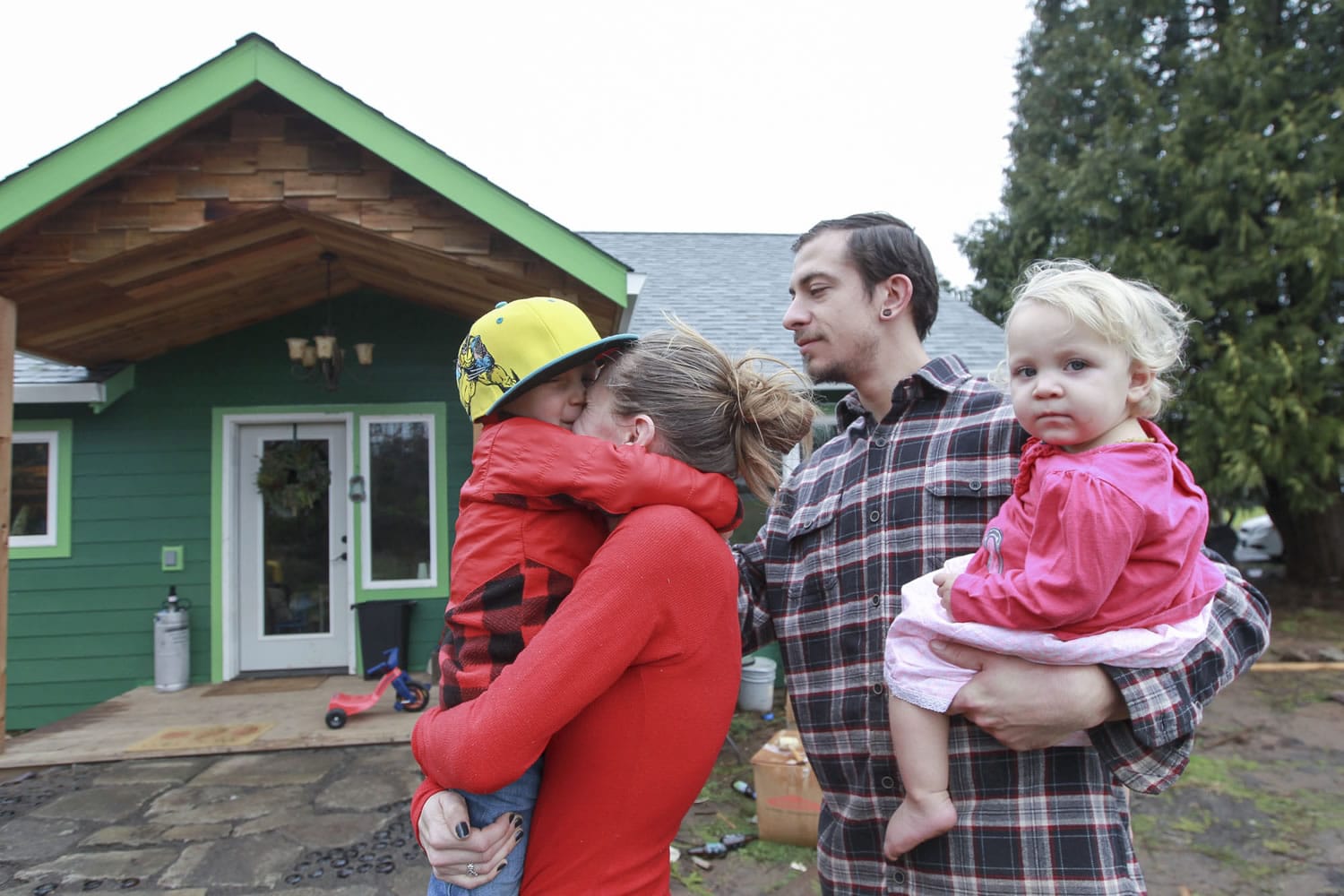 Patricia Kent and Dillon Haggerty, pictured with their son, Quintin, and daughter, Cadence, spent the last year renovating a dilapidated farmhouse into their dream home using natural building practices.