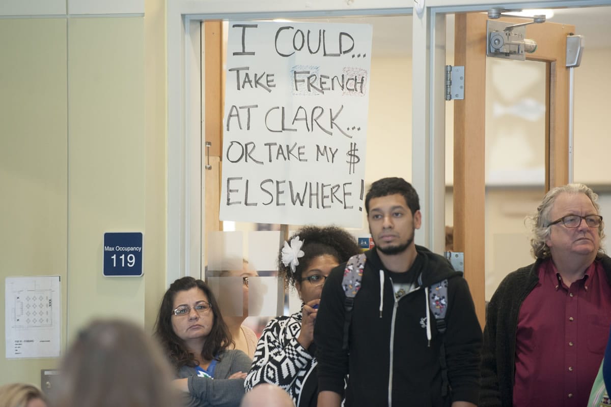 French students protest proposed budget cuts that would eliminate the French program during a forum Thursday at Clark College.