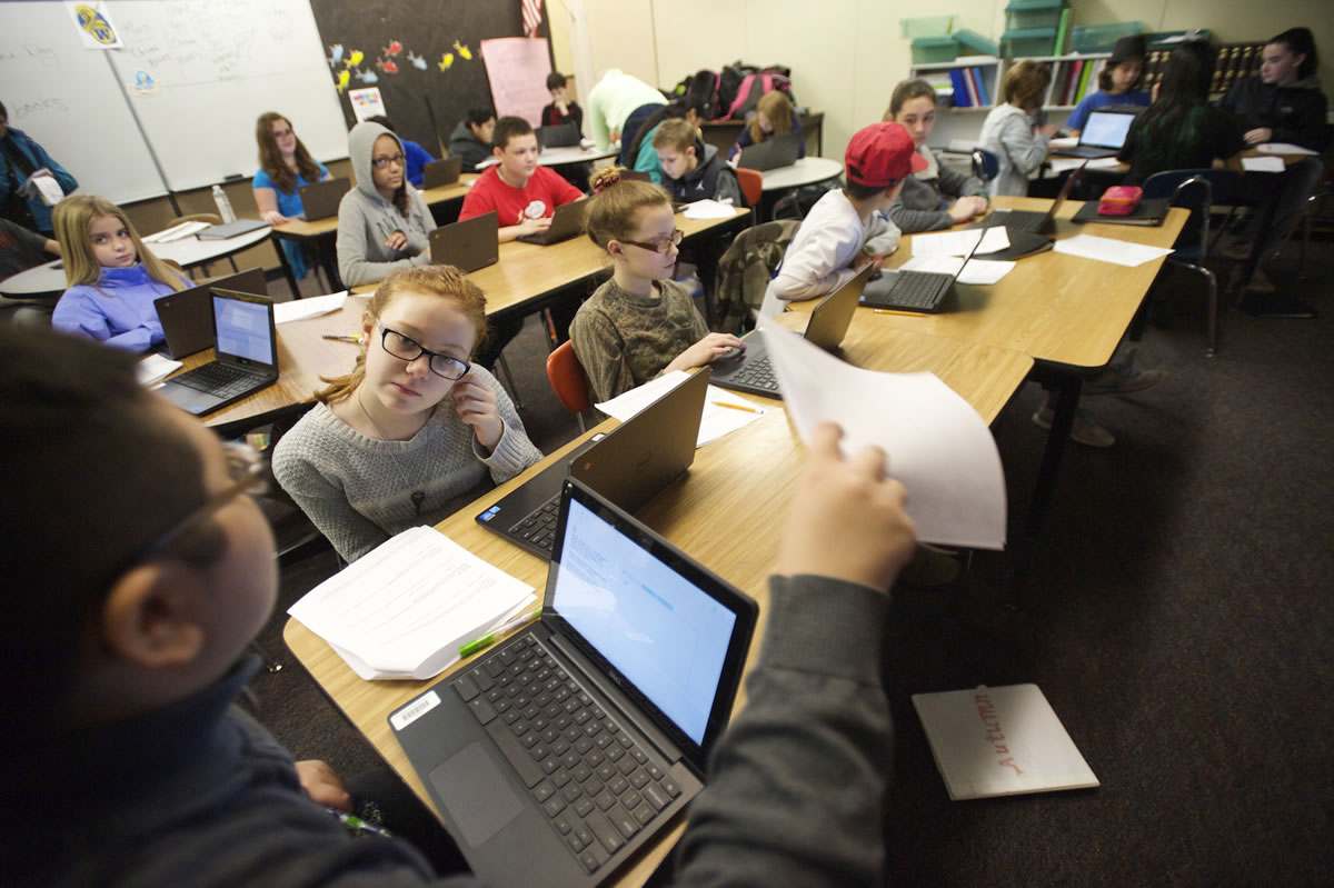 Sixth graders at Wy'East Middle School use Chrome Books to take practice tests in February.