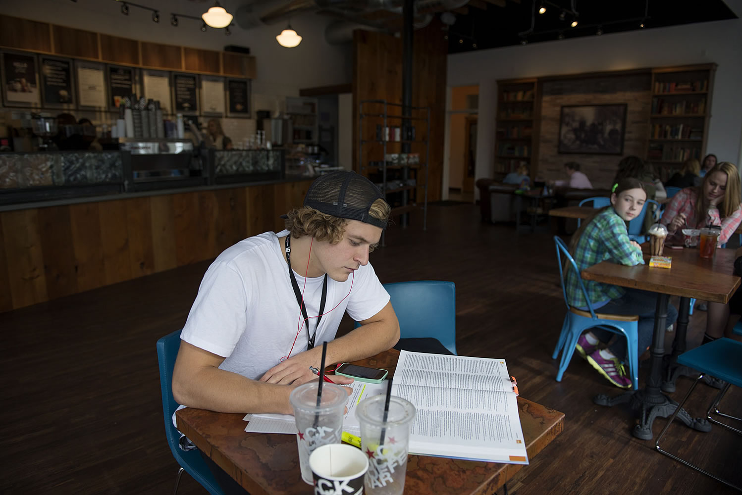 Igor Shapoval, a nursing student at Clark College, works on homework Friday afternoon at Black Rock Coffee in downtown Vancouver.