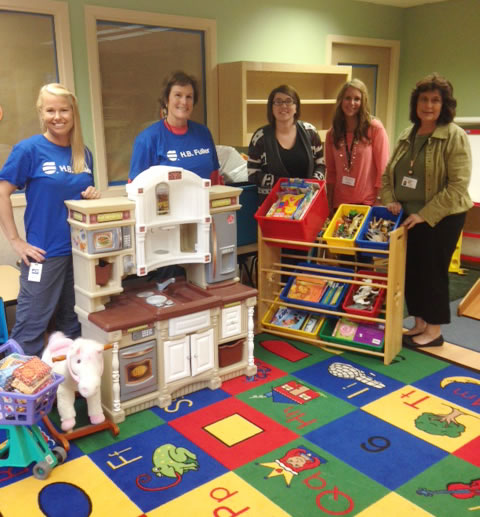 Meadow Homes: H.B. Fuller donated toys and learning materials to Educational Services District 112. From left: H.B.