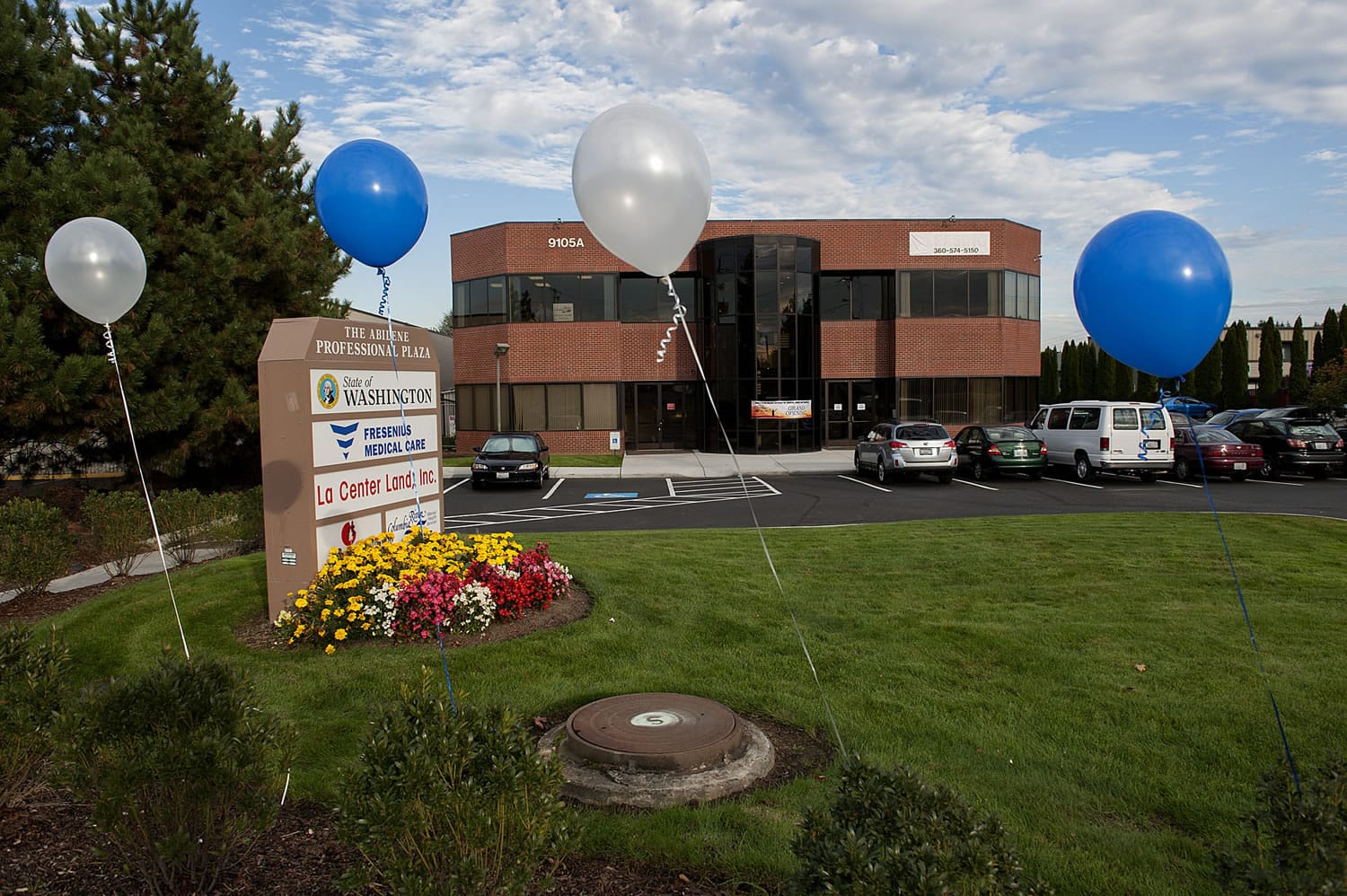 Blue and white balloons welcome visitors at the new Columbia River Mental Health Services offices during a Thursday open house at the new clinic in Hazel Dell.