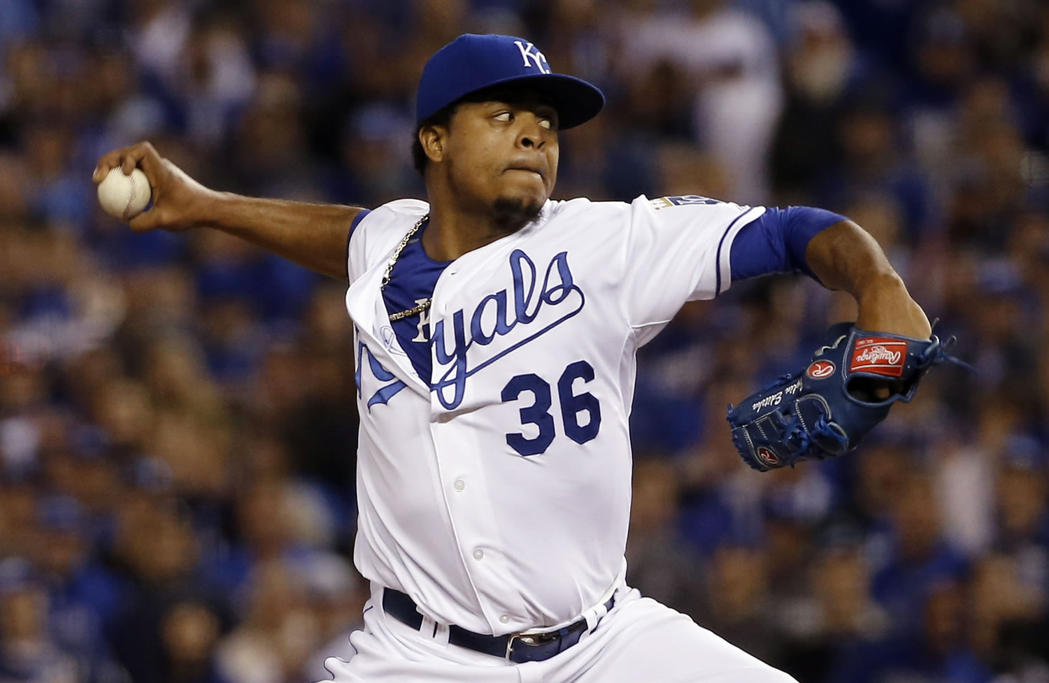 Kansas City Royals starting pitcher Edinson Volquez throws against the Toronto Blue Jays during the first inning in Game 1 of baseball's American League Championship Series, Friday, Oct. 16, 2015, in Kansas City, Mo.